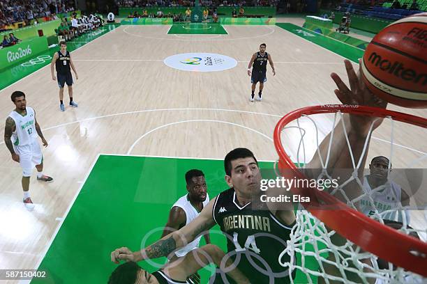 Gabriel Deck of Argentina shoots the ball during a Men's preliminary round basketball game between Nigeria and Argentina on Day 2 of the Rio 2016...