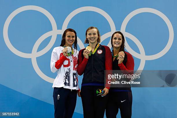 Silver medalist Jazz Carlin of Great Britain, gold medalist Katie Ledecky of the United States and bronze medalist Leah Smith of the United States...