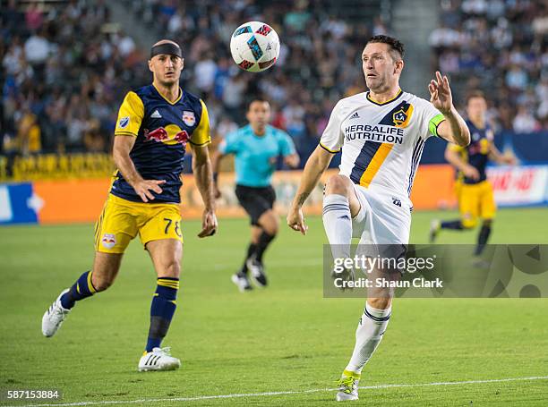 Robbie Keane of Los Angeles Galaxy brings the ball down during Los Angeles Galaxy's MLS match against the New York Red Bulls at the StubHub Center on...