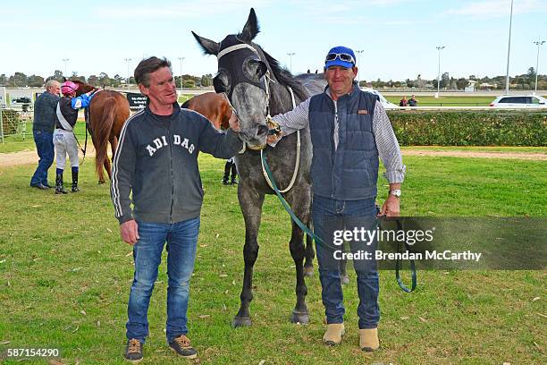 Gwenda Johnstone, She's Just Lika and strapper Dean Boal after winning Vetta Spaghetti BM58 Handicap at Swan Hill Racecourse on August 08, 2016 in...