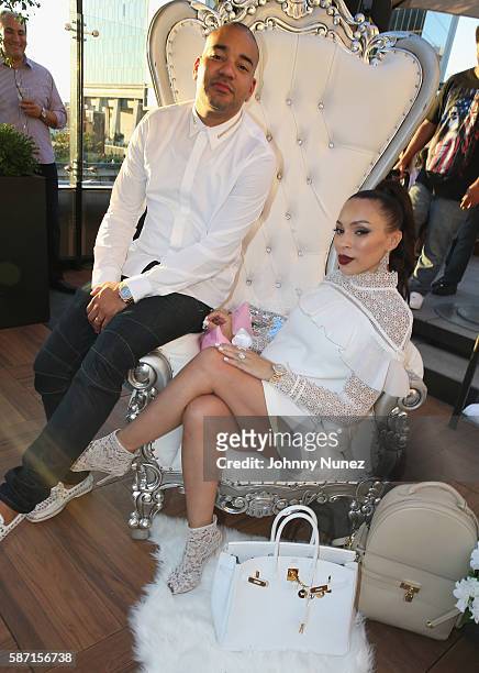 Envy and Gia Casey attend a Surprise Baby Shower For Gia Casey Hosted By 50 Cent at STK on July 24, 2016 in New York City.
