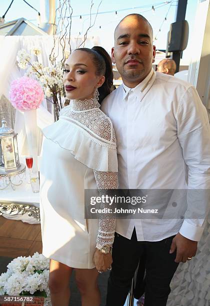 Gia Casey and DJ Envy attend a Surprise Baby Shower For Gia Casey Hosted By 50 Cent at STK on July 24, 2016 in New York City.