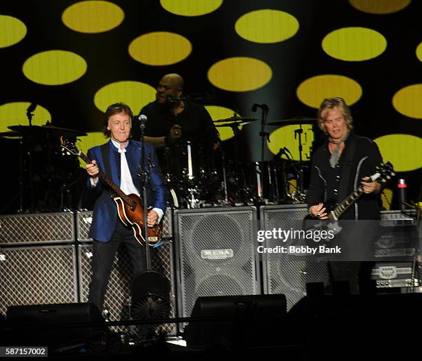 Singer Paul McCartney and guitarist Brian Ray perform from the One On One Tour at MetLife Stadium on August 7, 2016 in East Rutherford, New Jersey.