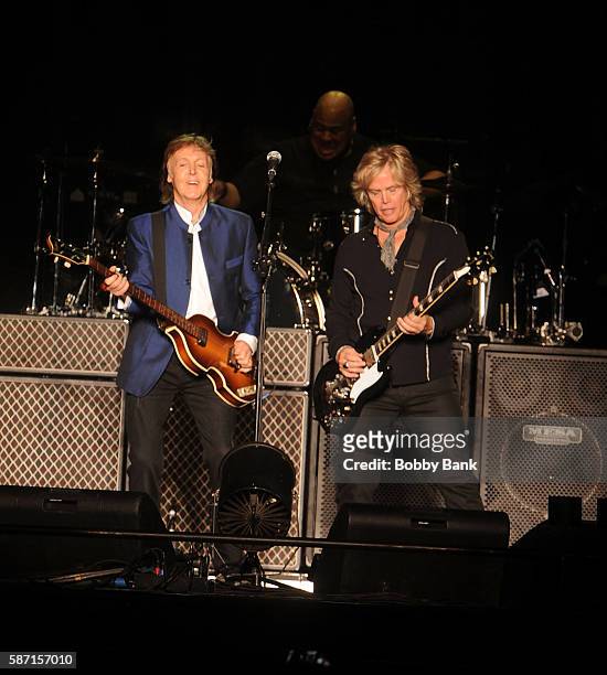 Singer Paul McCartney and guitarist Brian Ray perform from the One On One Tour at MetLife Stadium on August 7, 2016 in East Rutherford, New Jersey.