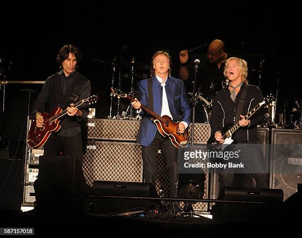 Singer Paul McCartney, guitarist Brian Ray, guitarist Rusty Anderson and drummer Abe Laboriel Jr. Perform from the One On One Tour at MetLife Stadium...