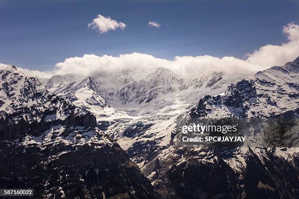 swiss alps from grindelwald - schreckhorn stock-fotos und bilder