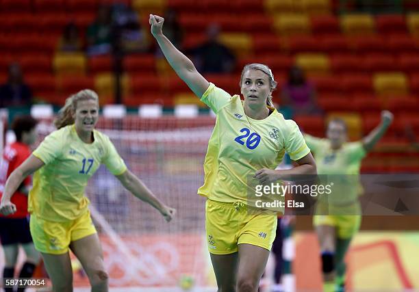 Isabelle Gullden and Linnea Torstensson of Sweden celebrate in the first half against Korea on Day 3 of the Rio 2016 Olympic Games at the Future...