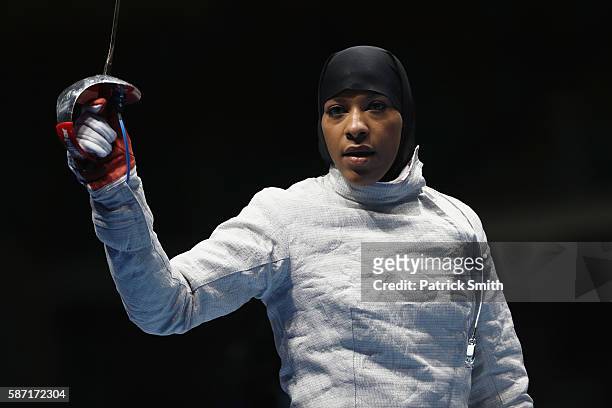 Ibtihaj Muhammad of the United States looks on during the Women's Individual Sabre on Day 3 of the Rio 2016 Olympic Games at Carioca Arena 3 on...