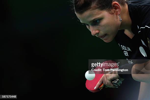 Petrissa Solja of Germany competes against Myong Sun Ri of North Korea during Round 3 of the Women's Singles Table Tennis on Day 3 of the Rio 2016...