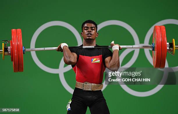 Seychelles' Rick Yves Confiance competes during the men's 62kg weightlifting event at the Rio 2016 Olympic games in Rio de Janeiro on August 8, 2016....