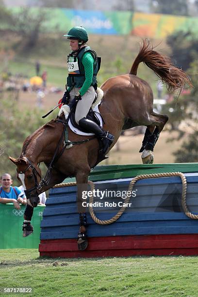 Clare Abbott of Ireland riding Euro Prince clears a jump during the Cross Country Eventing on Day 3 of the Rio 2016 Olympic Games at the Olympic...