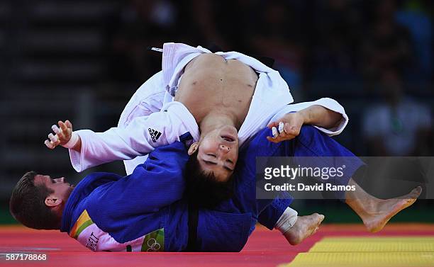 Changrim An of Korea competes against Dirk van Tichelt of Belgium in the Men's -73 kg Judo elimination round on Day 3 of the Rio 2016 Olympic Games...
