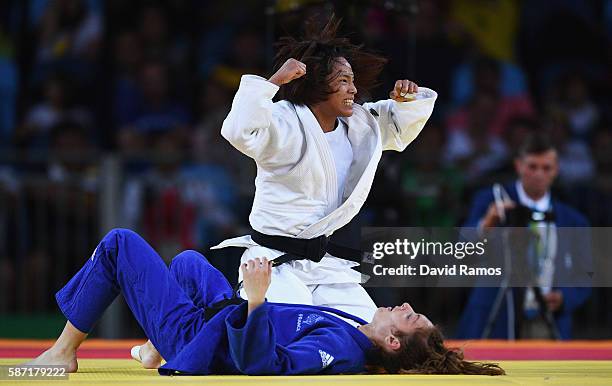 Kaori Matsumoto of Japan celebrates after defeating Automne Pavia of France in the Women's -57 kg Judo quarterfinal on Day 3 of the Rio 2016 Olympic...