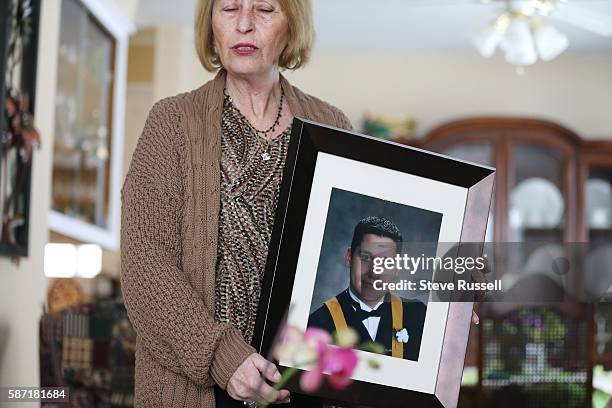 Nova ScotiaDonna Rice holds a photo of her son Glen at their home in Windsor, Nova Scotia. Glen Race's parents hope they they can get a retrail in...