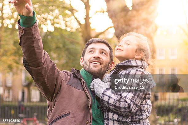 father and daughter - trip hazard stock pictures, royalty-free photos & images