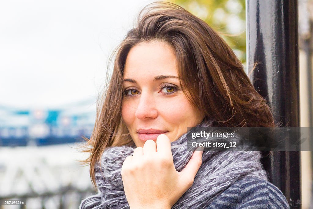 Young Adult woman with scarf in autumn London