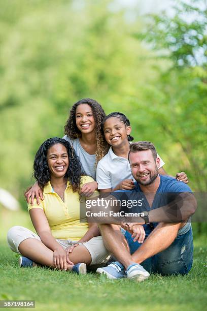 mixed race family - family formal portrait stock pictures, royalty-free photos & images