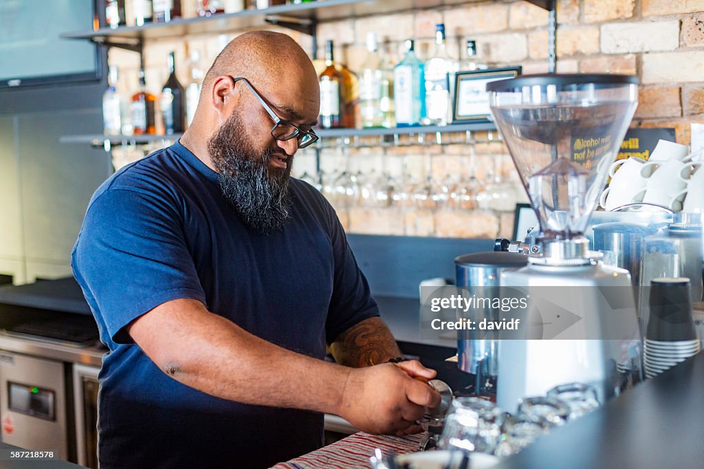 Maori Businessman Working in a New Zealand Bar or Cafe