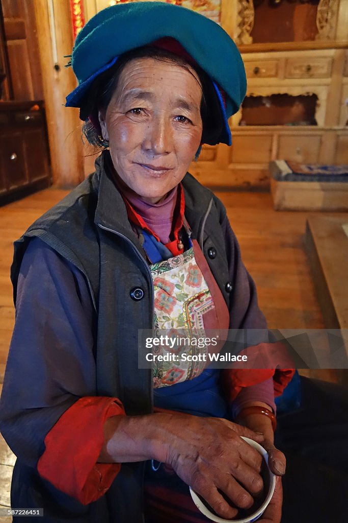 Tibetan Woman In Her Kitchen