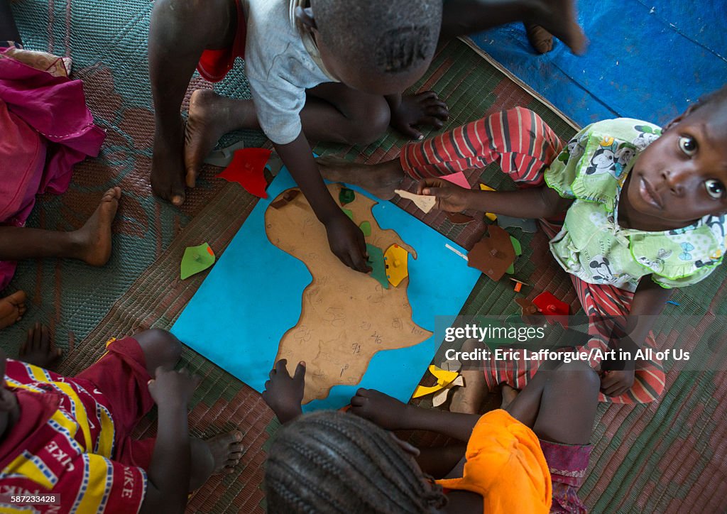 Nyangatom and toposa tribe children at school, Omo valley, Kangate, Ethiopia