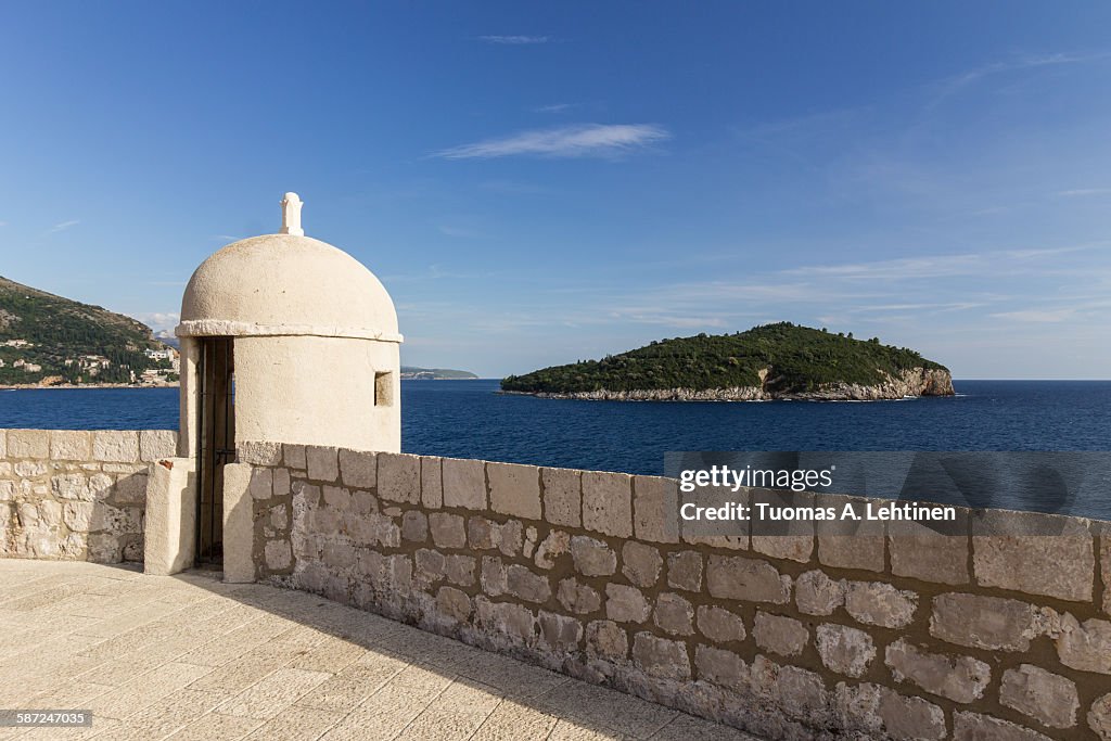 Small tower and Lokrum Island in Dubrovnik