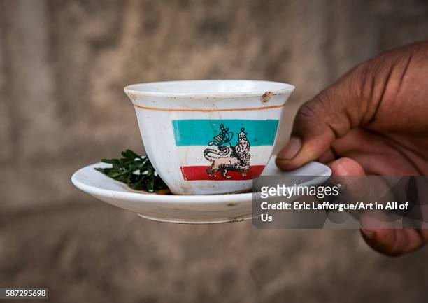Cup of ethiopian coffee with lion of judah on it, oromia, metehara, Ethiopia on March 3, 2016 in Metehara, Ethiopia.