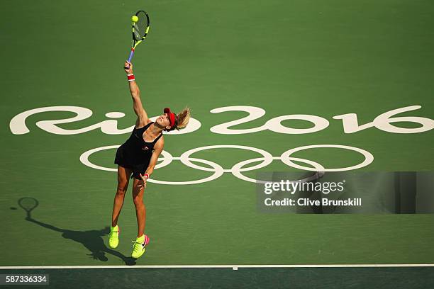 Eugenie Bouchard of Canada serves during the Women's Singles second round match against Angelique Kerber of Germany on Day 3 of the Rio 2016 Olympic...