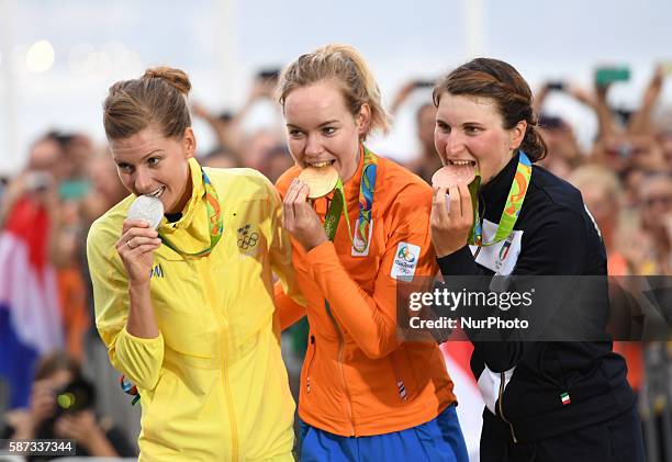 Anna van der Breggen of Netherlands , Emma Johansson of Sweden and Elisa Longo Borghini of Italy pose for a photo at the awarding ceremony of the...