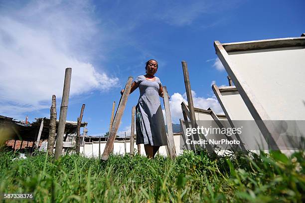 Phampha Gurung, 49 yrs old set to dry Nepalese traditional handmade lokta paper in the sun at Bhumisthal, Kathmandu, Nepal on August 08, 2016. Since...