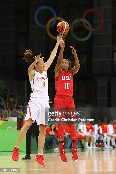 Tamika Catchings of United States attempts a shot over Laia Palau of Spain during the women's basketball game on Day 3 of the Rio 2016 Olympic Games...