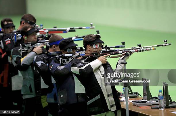 Athletes compete in the qualifying portion of the 10m Air Rifle event on Day 3 of the Rio 2016 Olympic Games at the Olympic Shooting Centre on August...