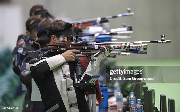 Athletes compete in the qualifying portion of the 10m Air Rifle event on Day 3 of the Rio 2016 Olympic Games at the Olympic Shooting Centre on August...