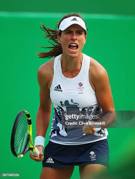 Johanna Konta of Great Britain celebrates match point and victory during the Women's Singles second round match against Caroline Garcia of France on...