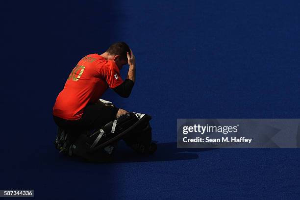 David Carter of Canada kneels in goal against Argentina during a Men's Pool B match on Day 3 of the Rio 2016 Olympic Games at the Olympic Hockey...