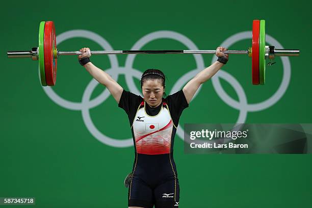 Mikiko Andoh of Japan competes during the Women's 58kg Group A weightlifting contest on Day 3 of the Rio 2016 Olympic Games at the Riocentro -...