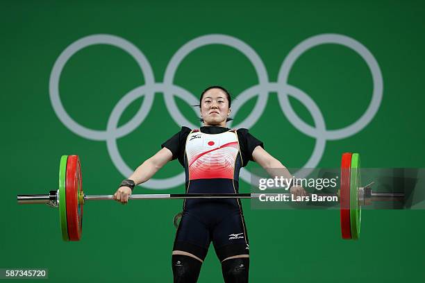 Mikiko Andoh of Japan competes during the Women's 58kg Group A weightlifting contest on Day 3 of the Rio 2016 Olympic Games at the Riocentro -...