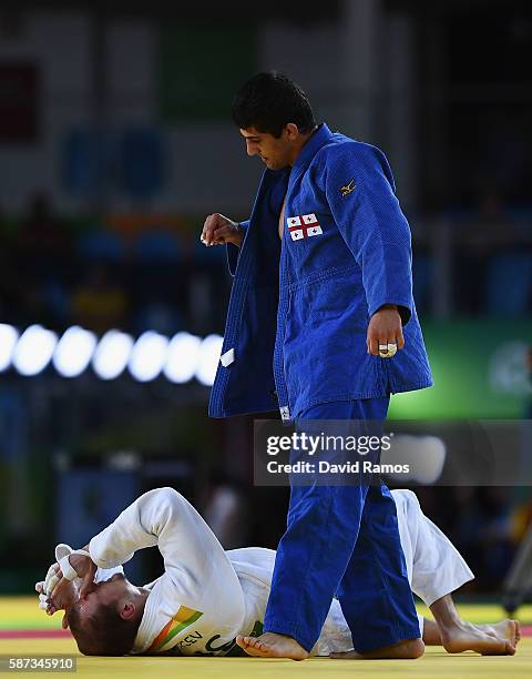 Lasha Shavdatuashvili of Georgia celebrates after defeating Denis Iartcev of Russia in the Men's -73 kg Repechage contest on Day 3 of the Rio 2016...