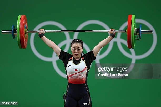 Mikiko Andoh of Japan competes during the Women's 58kg Group A weightlifting contest on Day 3 of the Rio 2016 Olympic Games at the Riocentro -...