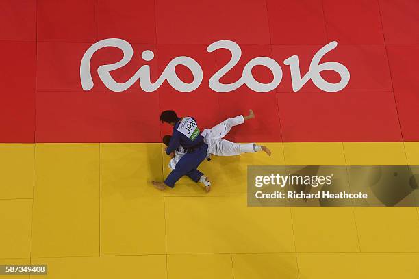 Shohei Ono of Japan competes against Dirk van Tichelt of Belgium in the Men's -73 kg Semifinal of Table A Judo match on Day 3 of the Rio 2016 Olympic...