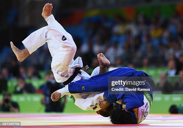 Shohei Ono of Japan competes against Dirk van Tichelt of Belgium in the Men's -73 kg Semifinal of Table A Judo match on Day 3 of the Rio 2016 Olympic...