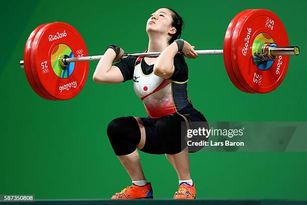 Mikiko Andoh of Japan competes during the Women's 58kg Group A weightlifting contest on Day 3 of the Rio 2016 Olympic Games at the Riocentro -...