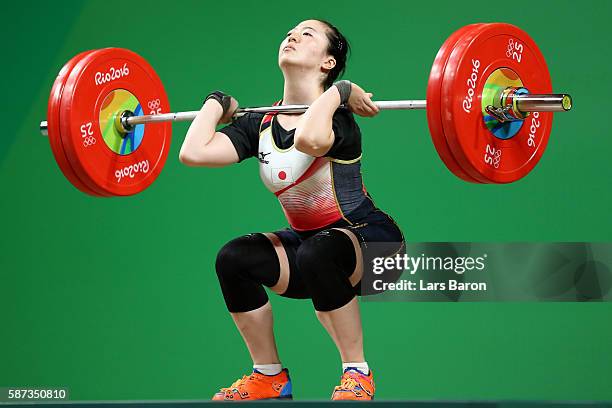 Mikiko Andoh of Japan competes during the Women's 58kg Group A weightlifting contest on Day 3 of the Rio 2016 Olympic Games at the Riocentro -...