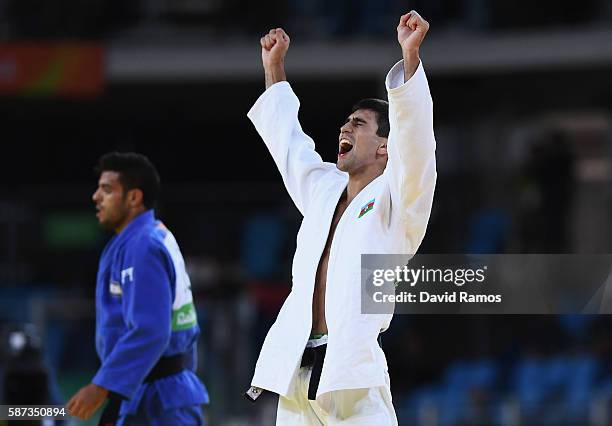 Rustam Orujov of Azerbaijan celebrates after defeating Sagi Muki of Israel in the Men's -73 kg Semifinal of Table B Judo match on Day 3 of the Rio...