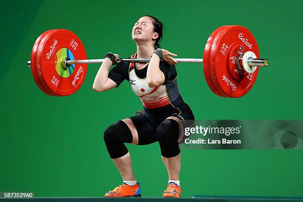 Mikiko Andoh of Japan competes during the Women's 58kg Group A weightlifting contest on Day 3 of the Rio 2016 Olympic Games at the Riocentro -...