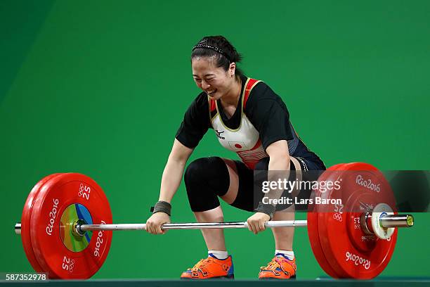 Mikiko Andoh of Japan competes during the Women's 58kg Group A weightlifting contest on Day 3 of the Rio 2016 Olympic Games at the Riocentro -...