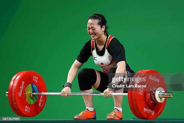 Mikiko Andoh of Japan competes during the Women's 58kg Group A weightlifting contest on Day 3 of the Rio 2016 Olympic Games at the Riocentro -...