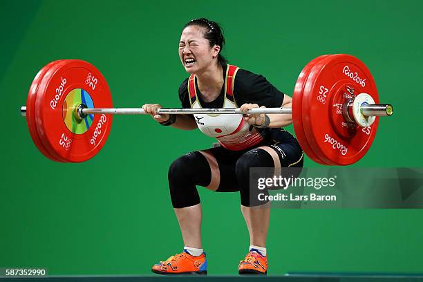 Mikiko Andoh of Japan competes during the Women's 58kg Group A weightlifting contest on Day 3 of the Rio 2016 Olympic Games at the Riocentro -...