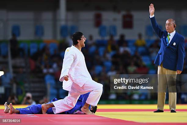 Lasha Shavdatuashvili of Georgia celebrates after defeating Sagi Muki of Israel in the Men's -73 kg Contest for Bronze Medal A on Day 3 of the Rio...