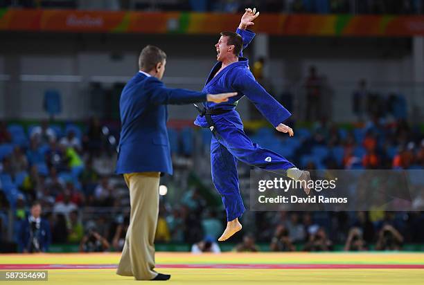 Dirk van Tichelt of Belgium celebrates after defeating Miklos Ungvari of Hungary in the Men's -73 kg Contest for Bronze Medal B on Day 3 of the Rio...