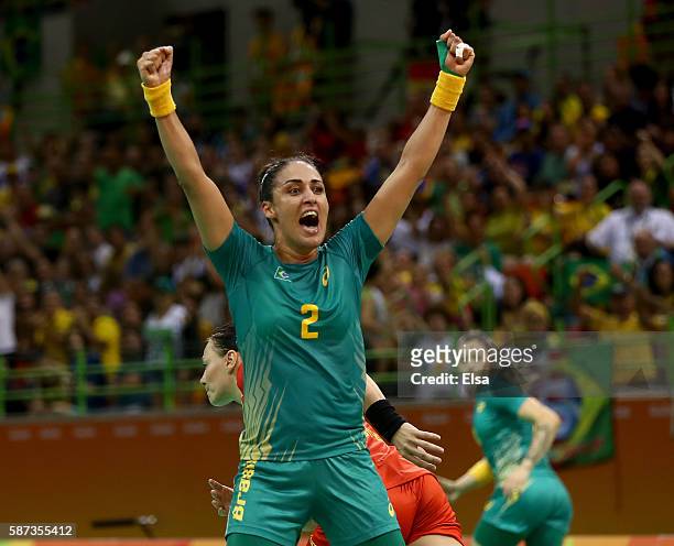 Fabiana Diniz of Brazil celebrates after teammate Barbara Arenhart made a save in the first half against Romania on Day 3 of the Rio 2016 Olympic...